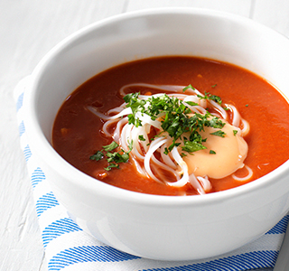 Asian tomato soup with tender chicken thigh