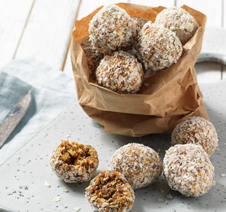 Energy balls of dates, chia seeds and pumpkin seeds