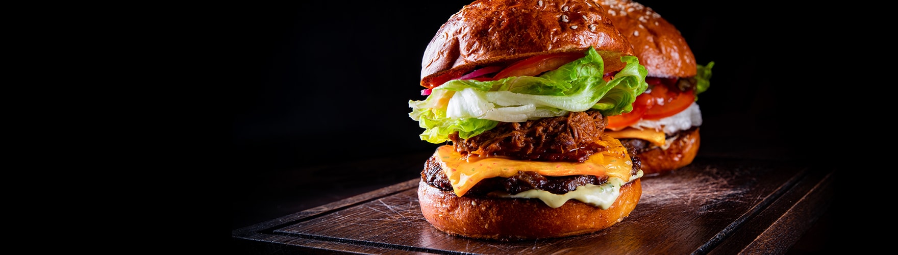 Pulled chicken burger with robust cheese slices